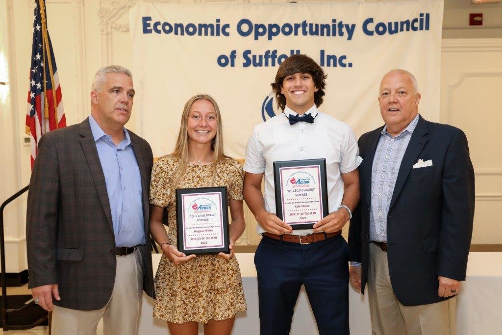 St. John the Baptist Diocesan High School nominees Meghan White and Kyle Chase are flanked by Dellecave Foundation co-directors (left) Mark Dellecave and (right) Guy Dellecave.